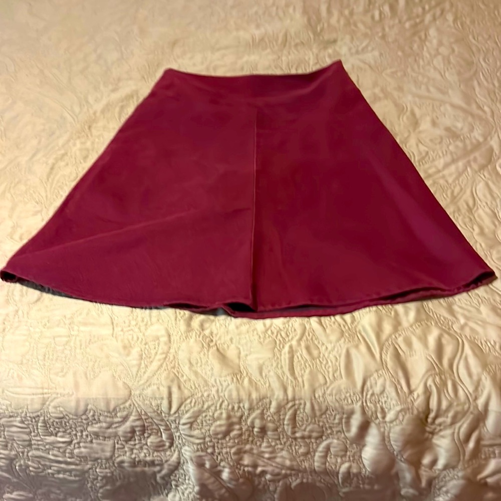 Betabrand burgundy, medium skirt with shorts attached. Lightly worn. Length 23”